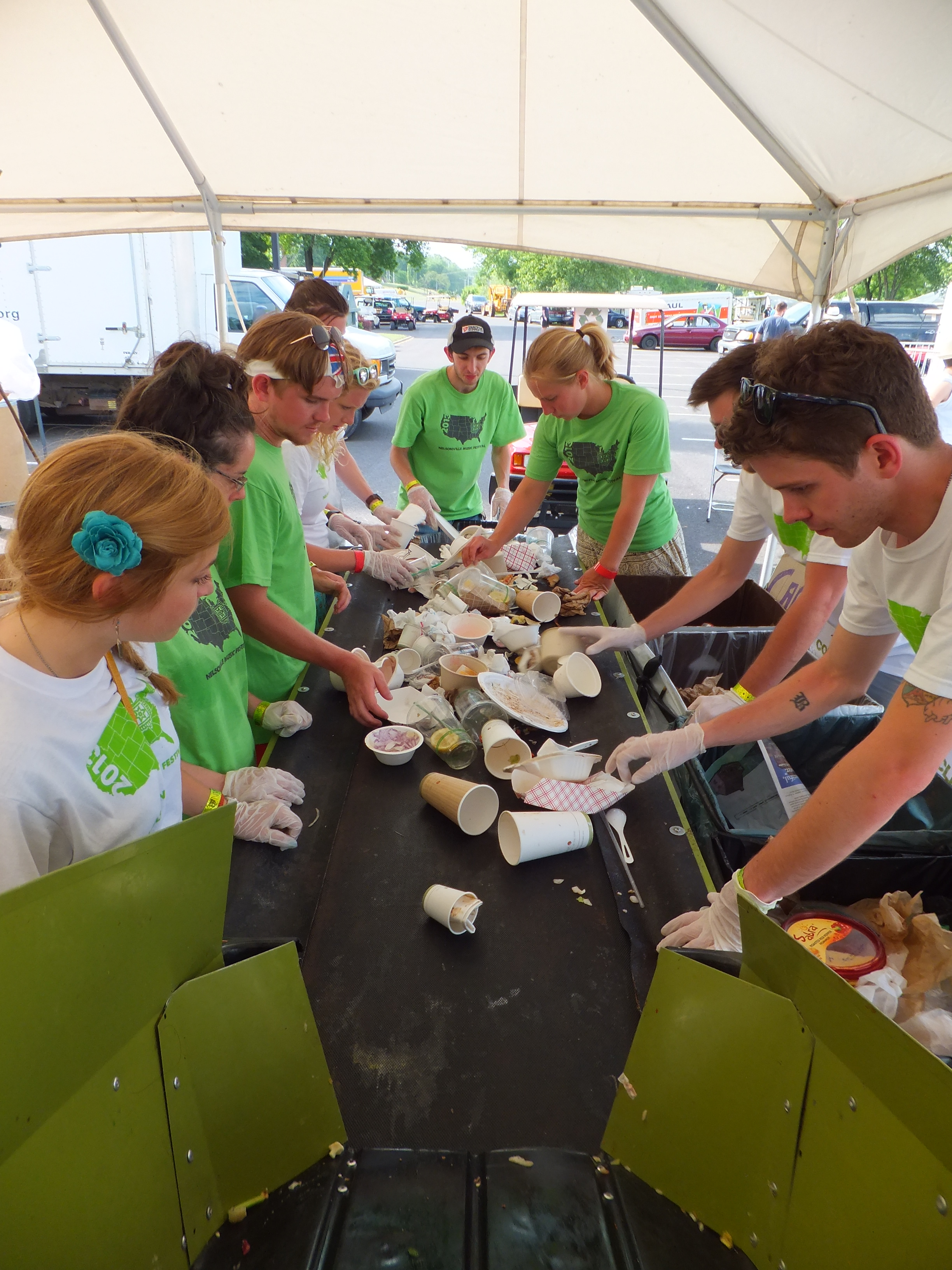 Volunteers sort compostables at Nelsonville Music Festival 2013.